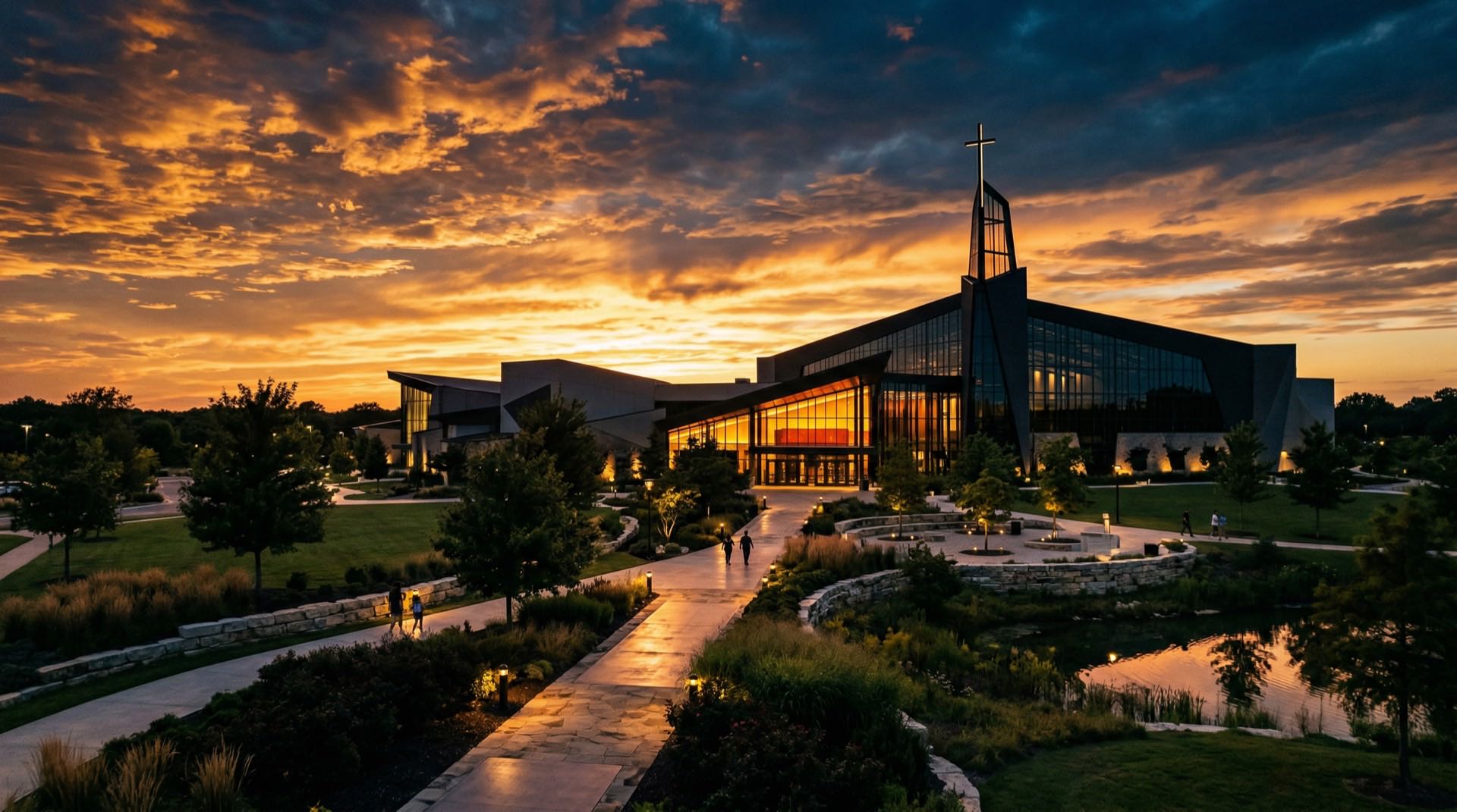 Church campus at sunset with warm amber sky
