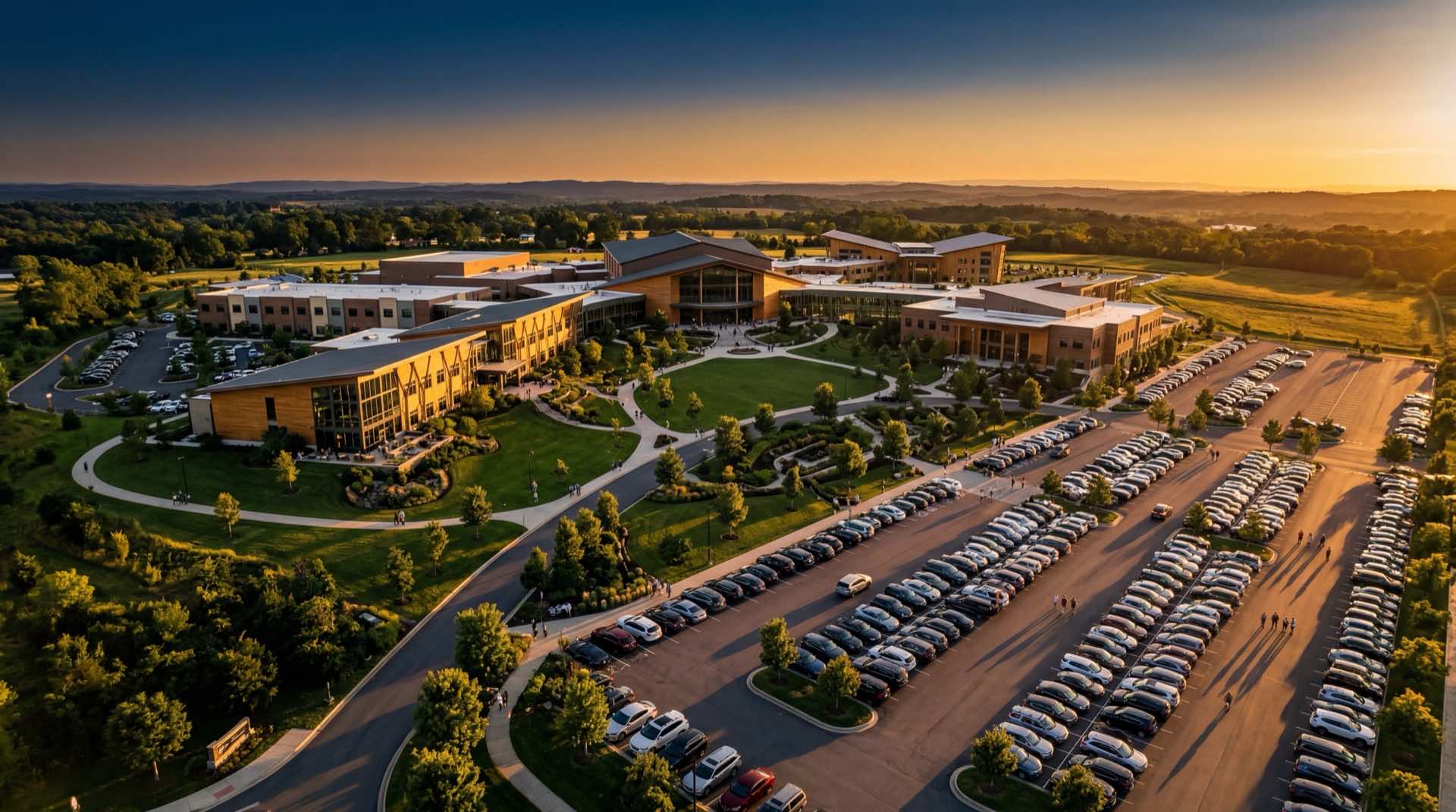 Aerial view of modern church campus at golden hour